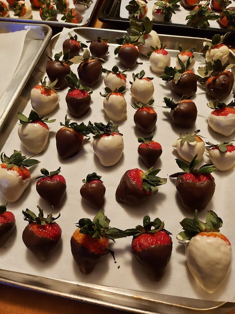 Colorful appetizer bites on a serving tray.
